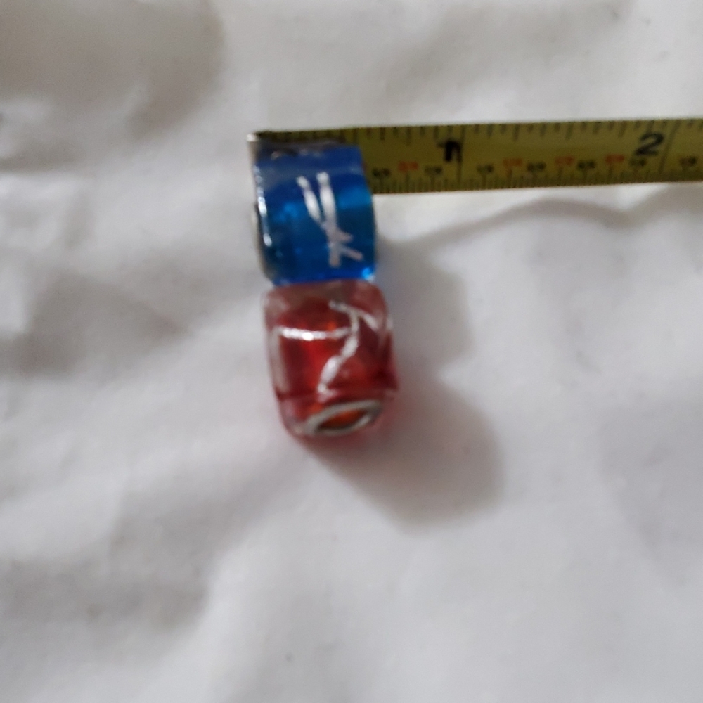 Glass charm beads